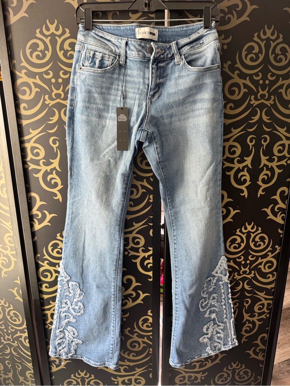 Fashion Nova Light Wash Flare Jeans with White Embroidery